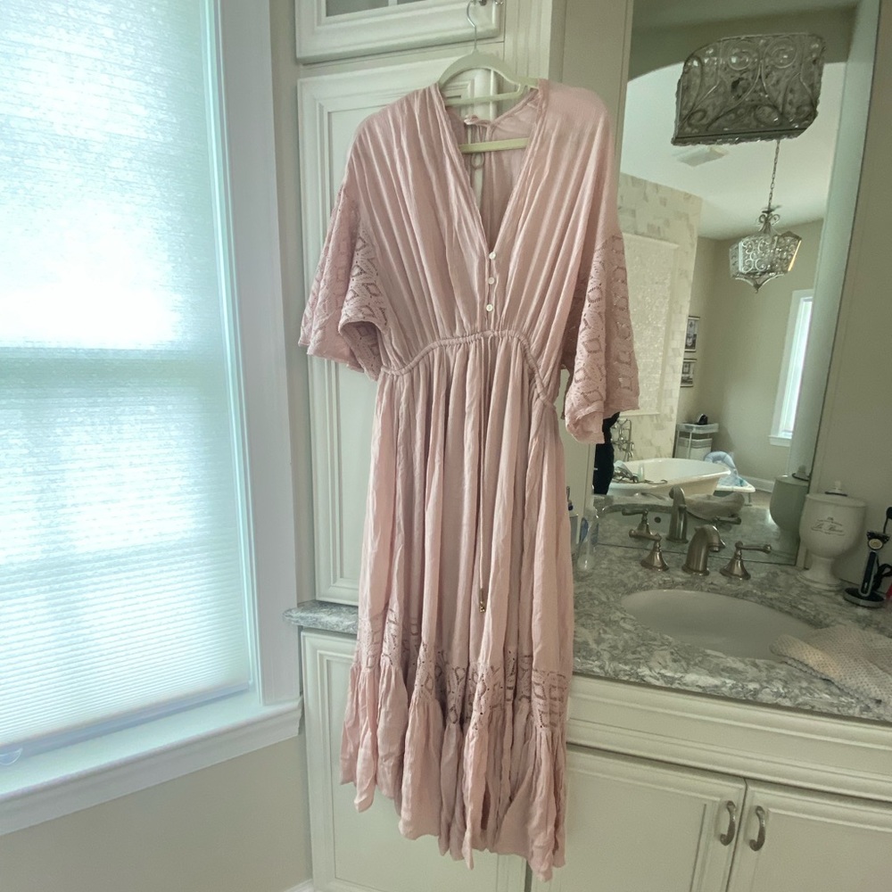 Free people Angela Front button jumpsuit sz. L